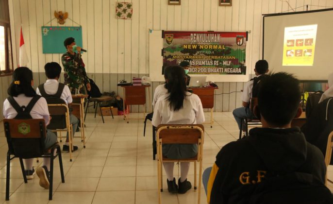 SATGAS PAMTAS RI-MLY YONIF RAIDER 200/BN Intensif Laksanakan Kegiatan Penyuluhan New Normal Kepada Murid SMAN 1 LONG BAGUN