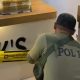 Foto dokumen Petugas Satpol PP Surabaya tengah melakukan penyegelan gerai es krim