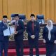 Penyerehan berkas pemandangan fraksi dalam rapat paripurna