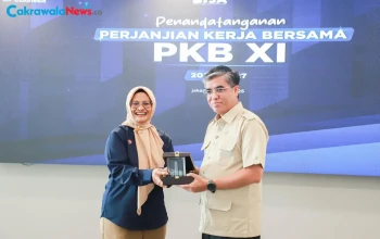 Menaker Dorong Hubungan Industrial Harmonis Lewat Penandatanganan PKB XI Telkom