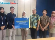 TASPEN Surabaya Serahkan Manfaat Jaminan Kecelakaan Kerja dan Beasiswa, Wujud Perlindungan Negara bagi Keluarga ASN